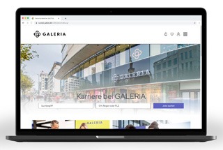 a laptop displaying a Galeria's webpage